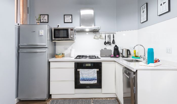 Toaster Oven on shelf In Small Kitchen