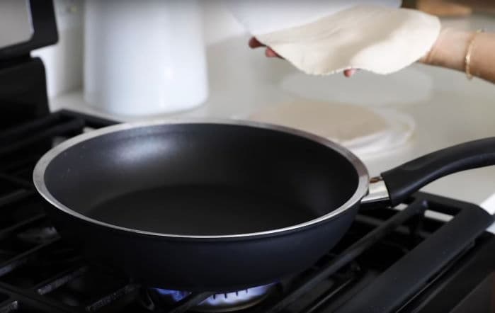 ceramic coated cookware on gas stove