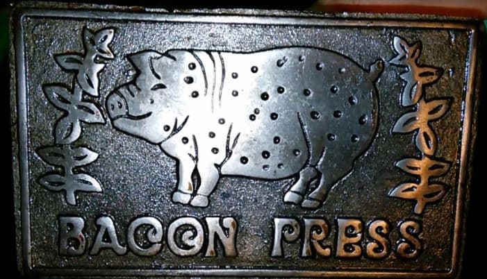 large square cast iron bacon press